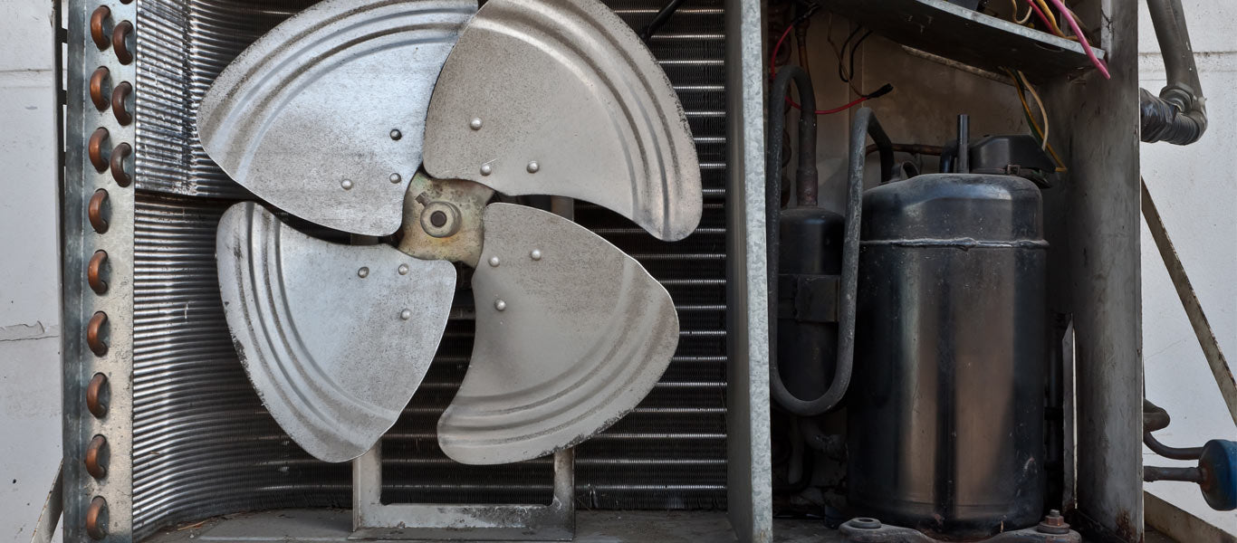 bad AC compressor in air conditioning unit