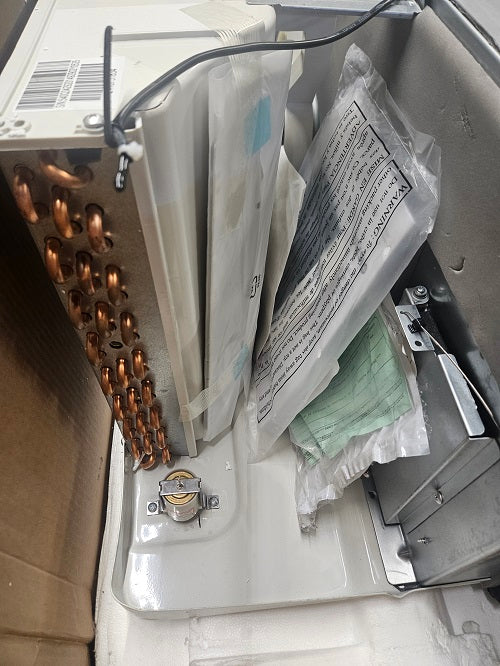 Scratch and Dent Amana Distinctions Model 12,000 BTU PTAC Unit with Heat Pump and 5 kW Electric Heat Backup- Model DHP123A50AA-2410751834