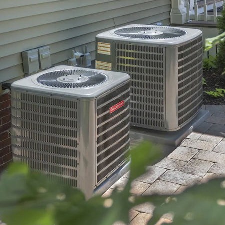 Image of two Goodman outdoor air conditioner units